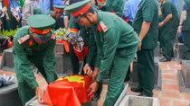 Truy điệu, an táng hài cốt liệt sỹ quân tình nguyện và chuyên gia Việt Nam