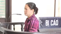 Án chung thân cho phụ nữ mang 6 bánh ma túy Lào vào Việt Nam