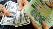 Đồng Việt Nam có thể giảm giá thêm 1%