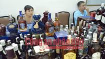 Cặp vợ chồng và lò rượu Chivas giả giữa lòng Hà Nội