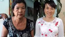 Hai phụ nữ đồng bào dân tộc thiểu số làm theo lời Bác