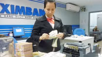 USD tăng giảm trong biên độ cho phép