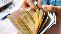 Mức lương cơ sở đối với cán bộ, công chức là 1.210.000 đồng/tháng 