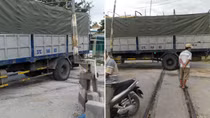 Hoảng hồn xe tải “nghỉ” trên đường ray khi tàu hỏa đang lao đến