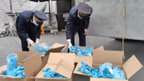 Khởi tố vụ nhập khẩu gần 6 tấn găng tay đã qua sử dụng