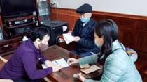 BHXH Nam Định phối hợp với Bưu điện chi trả lương hưu, trợ cấp BHXH tháng 4-5