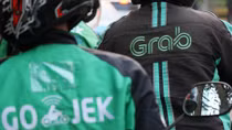 Cuộc chiến giành thị phần khốc liệt giữa Grab và Go-Jek