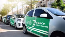 Bộ GTVT yêu cầu xe Uber, Grab dán logo