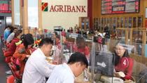 Agribank và Vietcombank đi đầu giảm lãi suất cho vay 