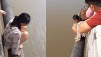 Bà mẹ bỏ con trên cầu định nhảy xuống sông Hồng tự tử
