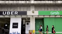 Grab thôn tính Uber: Nỗi lo độc quyền