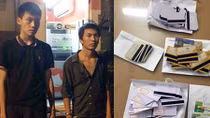 Hai người Trung Quốc dùng thẻ ATM giả rút trộm tiền tại Hà Nội