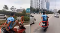 Xác định nam thanh niên điều khiển xe máy bằng chân đi vào đường BRT