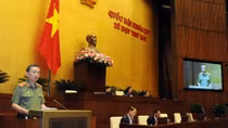 Bộ trưởng Tô Lâm đọc Tờ trình về Dự án Luật Xuất cảnh, nhập cảnh của công dân Việt Nam
