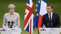 “Hiệu ứng Macron” và “nỗi buồn Grenfell Tower” của Thủ tướng Theresa May