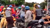 Người dân hỗ trợ CSGT khống chế kẻ chống người thi hành công vụ