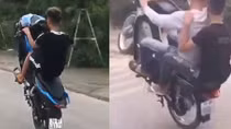 Hai thanh niên bị phạt vì khoe clip bốc đầu xe máy