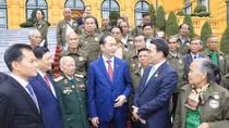 Chủ tịch nước Trần Đại Quang gặp mặt đại biểu công dân Lào có công với cách mạng Việt Nam 