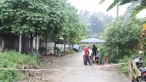 Thi thể người phụ nữ cháy đen ven đường