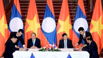 Quan hệ hữu nghị vĩ đại, tình đoàn kết đặc biệt Việt Nam-Lào ngày càng đơm hoa kết trái