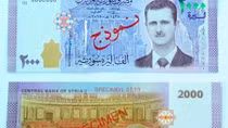 Syria đưa đồng bạc mới in chân dung Tổng thống Assad vào lưu thông
