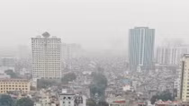 Hà Nội ô nhiễm, nhà chọc trời mất hút trong lớp bụi mịn khổng lồ
