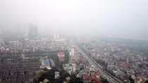 Hà Nội mờ ảo trong màn sương mù dày đặc