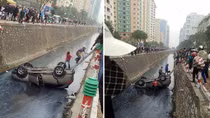 Đạp nhầm chân ga, xế hộp tiền tỷ "ngửa bụng" dưới mương nước