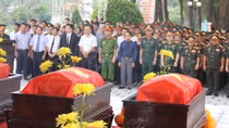 An táng 18 hài cốt liệt sĩ quân tình nguyện Việt Nam hy sinh tại Lào