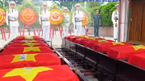 Tổ chức lễ an táng hài cốt quân tình nguyện Việt Nam hy sinh tại Lào và Campuchia