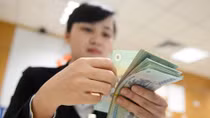 Ngân hàng thương mại cổ phần đầu tiên hạ lãi suất huy động
