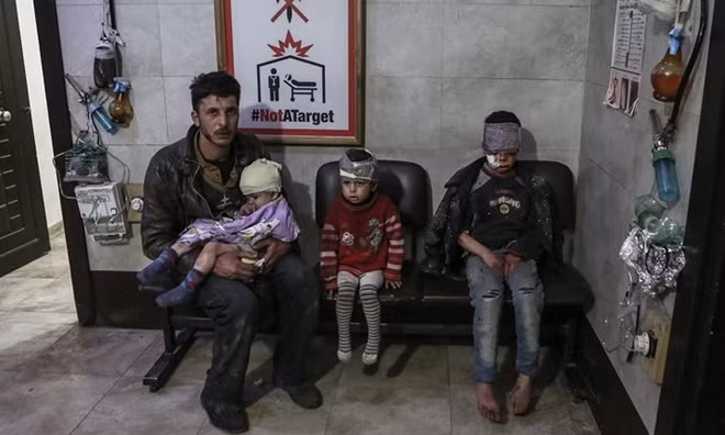 Một người đàn ông và 3 đứa con là nạn nhân của các đợt giao tranh tại Đông Ghouta.