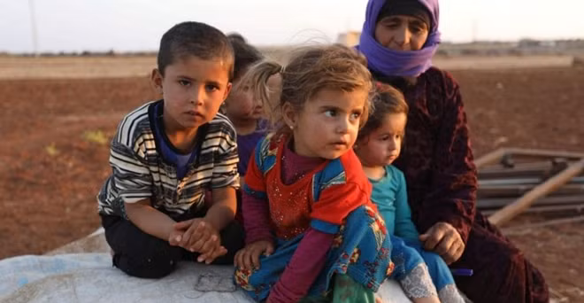 Các em bé Syria. Ảnh: EPA