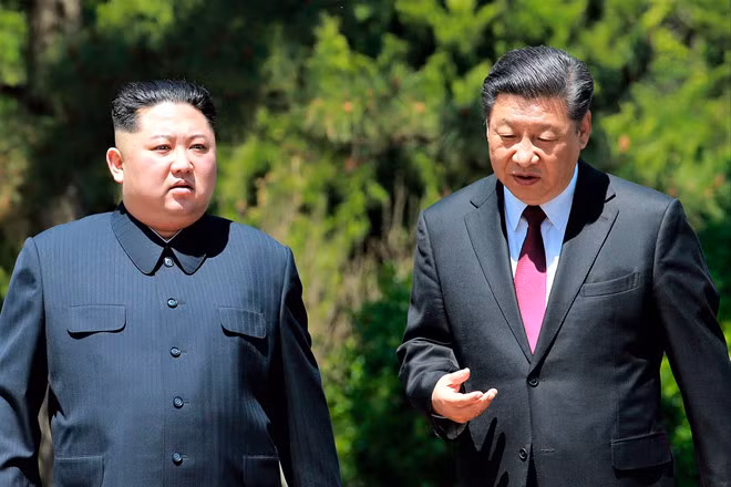 Lãnh đạo Trung-Triều tại cuộc gặp hồi tháng 5-2018. Ảnh: Reuters Lãnh đạo Trung-Triều tại cuộc gặp hồi tháng 5-2018. Ảnh: Reuters