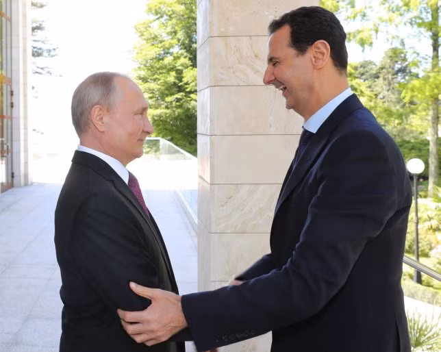 Tổng thống Nga Putin chào đón ông Assad thăm Nga năm 2018. Ảnh: TASS Tổng thống Nga Putin chào đón ông Assad thăm Nga năm 2018. Ảnh: TASS