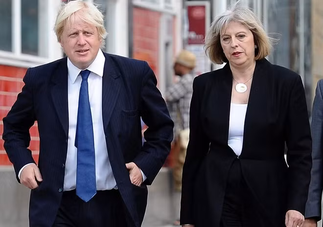 Ông Boris Johnson và bà Theresa May. Ảnh: Guardian