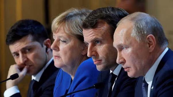 Lãnh đạo Nga, Pháp, Đức và Ukraine tại cuộc gặp ở Paris. Ảnh: Getty Images
