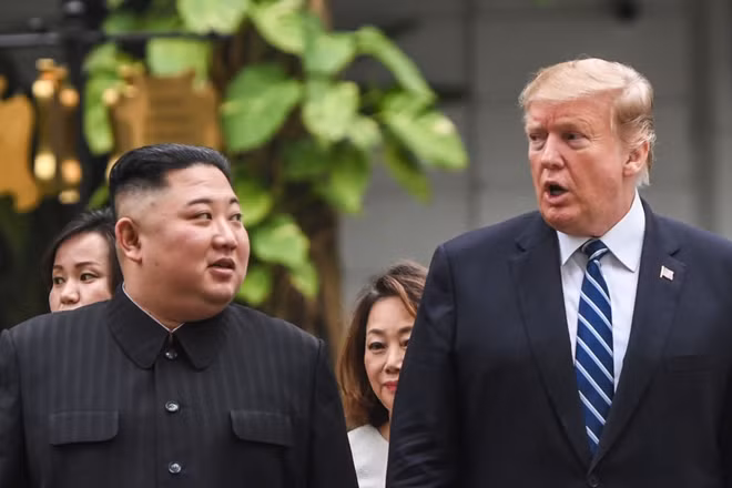 Lãnh đạo Mỹ-Triều tại cuộc gặp thượng đỉnh lần đầu. Ảnh: Reuters