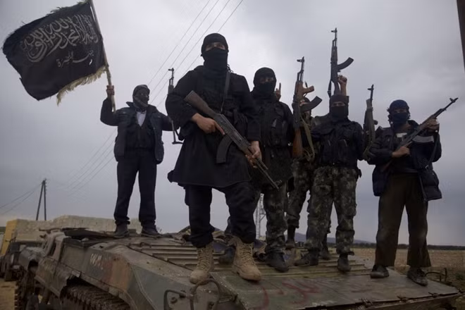 Các tay súng HTS ở Idlib. Ảnh: TSO