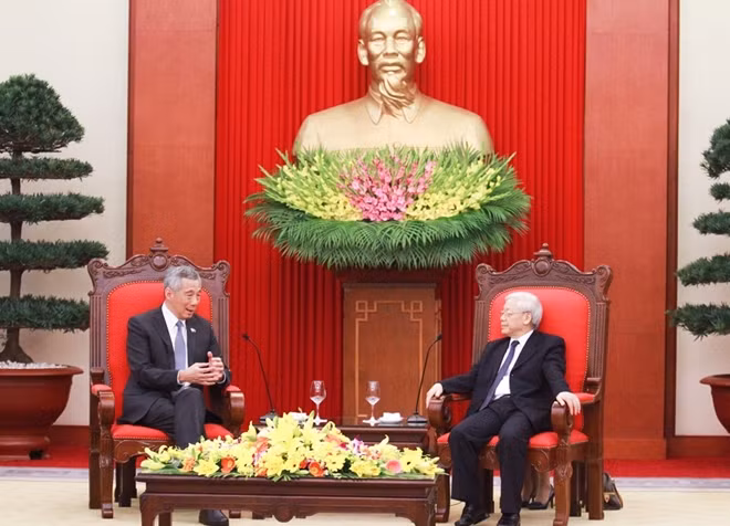Tổng Bí thư Nguyễn Phú Trọng và Thủ tướng Singapore Lý Hiển Long tại buổi tiếp.