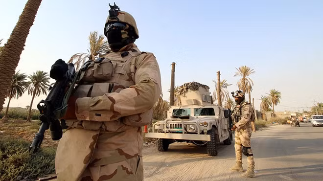 Binh lính Mỹ làm nhiệm vụ tại Iraq. Ảnh: Reuters