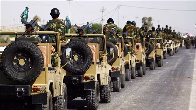 Binh sĩ Iraq trong một chiến dịch quân sự. Ảnh: ITN Binh sĩ Iraq trong một chiến dịch quân sự. Ảnh: ITN