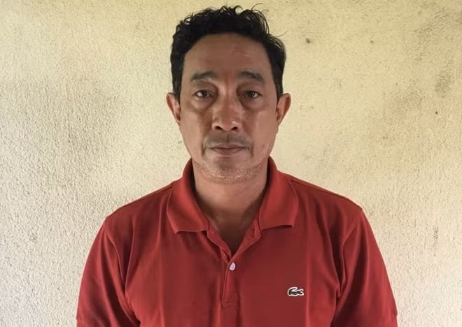 Dũng tại cơ quan điều tra.
