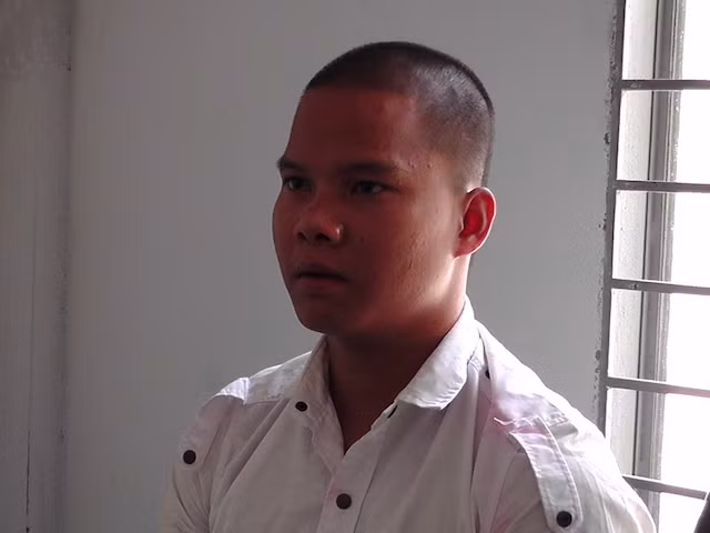 Bình tại cơ quan điều tra.