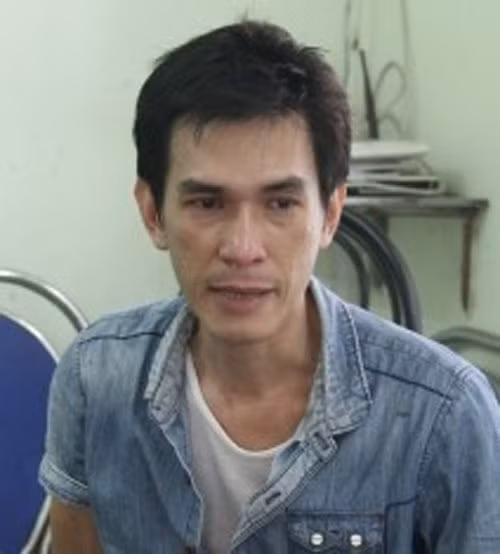 Đối tượng Nguyễn Minh Tiến sau khi bị bắt giữ.