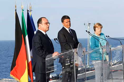 Ông Renzi (giữa) trong cuộc họp với lãnh đạo Pháp và Đức tại Italy. Ảnh: ABC.