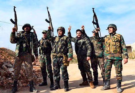 Quân chính phủ ăn mừng chiến thắng đường M5, ngoại vi Aleppo, Syria.