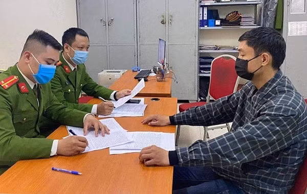 Lê Thanh Giang tại cơ quan Công an,