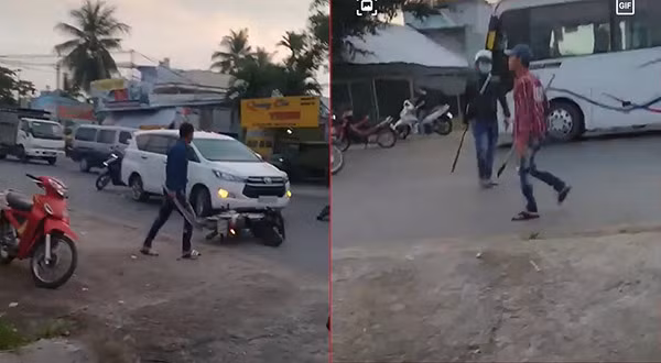 Các đối tượng dùng hung khí chém nhau tại hiện trường (ảnh được cắt từ clip của người dân).