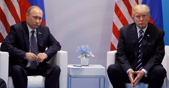 Tổng thống Mỹ khó xây dựng được mối quan hệ tốt đẹp với Nga và ông Putin giữa những căng thẳng leo thang giữa hai nước. Ảnh Reuters